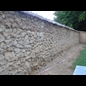 thumbnail Piquetage du mur du cimetière en vue de sa restauration